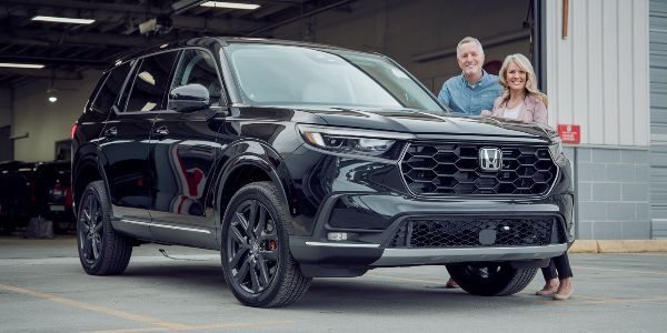 2025 Honda Pilot with customers after a Profirst ceritifed honda body shop repair Marina Auto Body ProFirst Certified Honda Body Shop car